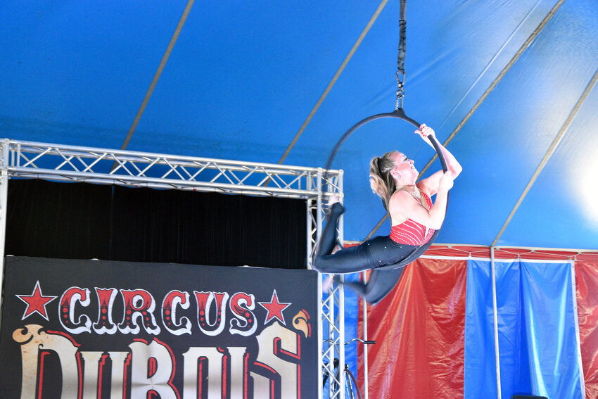 Viktoria Grimmy using an aerial hoop swinging in motion performing aerobatics on August 3.